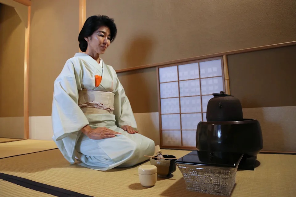 Tea ceremony master Keiko Kaneko demonstrates the tea ceremony at her tea house in Tokyo, Aug. 8, 2025. (AP Photo/Yuri Kageyama)