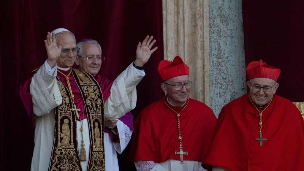 Newly elected Pope Leo XIV appears on the central loggia of St. Peter's Basilica at the Vatican shortly after his election as pontiff, on May 8, 2025. AP Photo/Domenico Stinellis