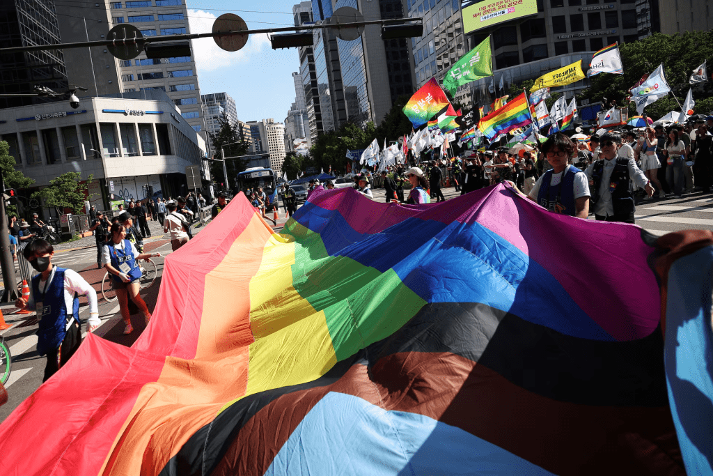 Participants parade with a huge rainbow flag during the Seoul Queer Culture Festival in Seoul, South Korea, June 1, 2024. REUTERS/Kim Hong-Ji 