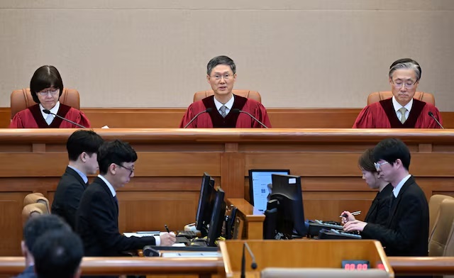 Moon Hyung-bae, acting Chief Justice of South Korea's Constitutional Court, speaks during the final ruling of South Korean President Yoon Suk Yeol's impeachment at the Constitutional Court on April 04, 2025 in Seoul, South Korea. Kim Min-Hee/Pool via REUTERS