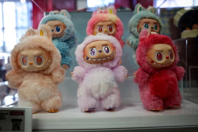 Toys are displayed at at Pop Mart's Skullpanda pop-up shop in Manhattan, in New York City, U.S., December 12, 2025. REUTERS/Mike Segar/File Photo