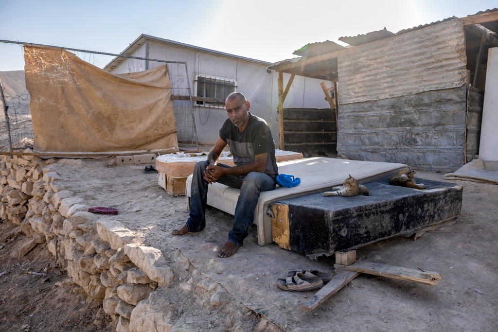 Photo by MENAHEM KAHANA / AFP  Ahmed Kaabneh, a Palestinian Bedouin man poses for a picture in his small village of Kaabneh, near Jericho in the occupied West Bank, on November 6, 2025.