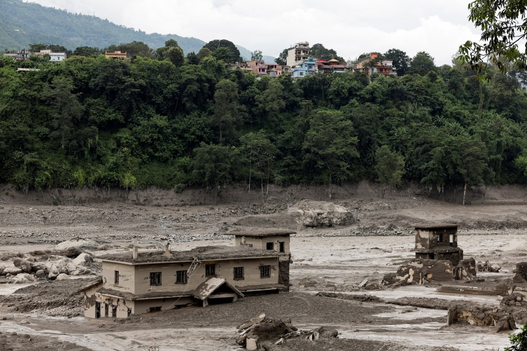 Mud covers buildings following a flash flood at Trishuli in Nuwakot district, Nepal, August 26, 2026. (Reuters)