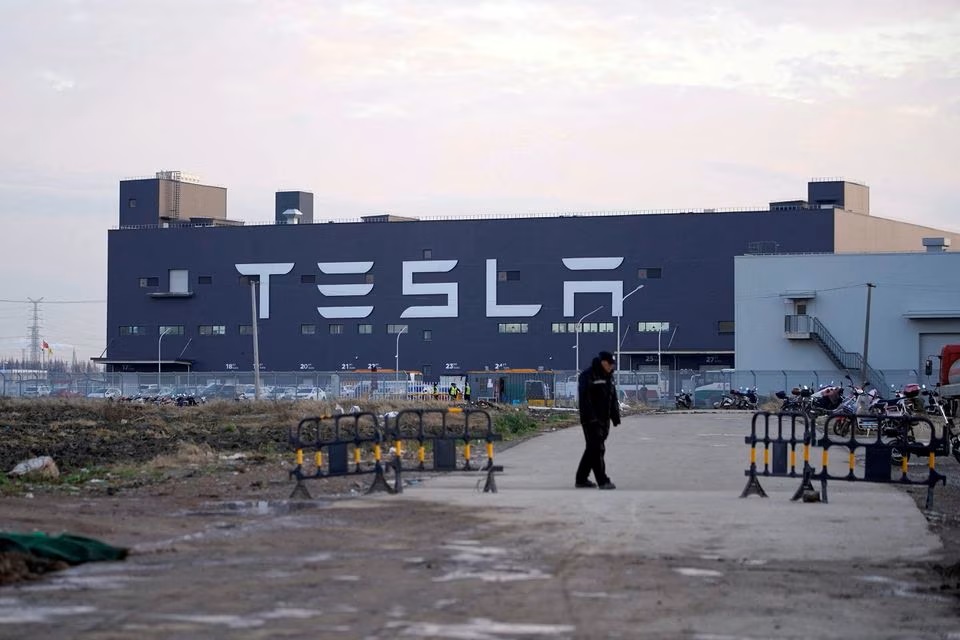 A Tesla sign is seen on the Shanghai Gigafactory of the U.S. electric car maker before a delivery ceremony in Shanghai, China. (Reuters) A Tesla sign is seen on the Shanghai Gigafactory of the U.S. electric car maker before a delivery ceremony in Shanghai, China. (Reuters)