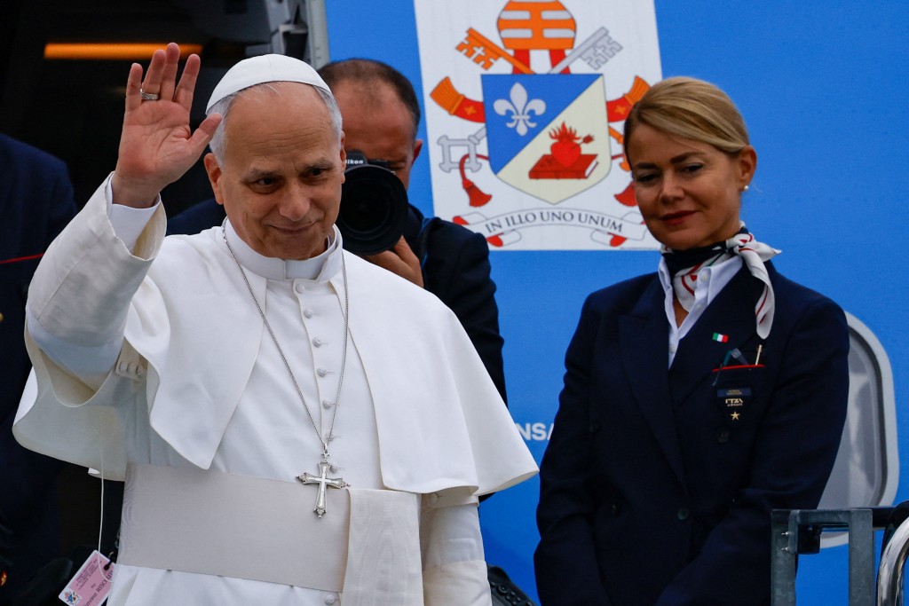 Pope Leo XIV waves at Ataturk Airport as he departs from Turkey to Lebanon. (Reuters)