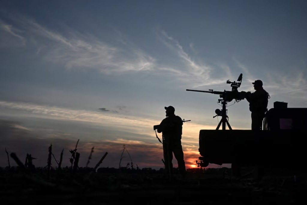 Service members of a mobile air defence unit of the 3rd Separate Assault Brigade observe the skyline during a combat shift on the front line, amid Russia's attack on Ukraine, in Kharkiv region, Ukraine September 15, 2025. REUTERS/Stringer