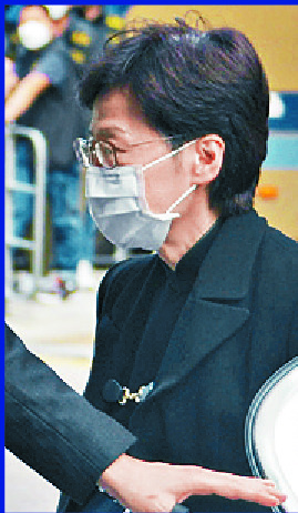 Carrie Lam, John Lee, left, and Chris Tang attend the ceremony. SING TAO
