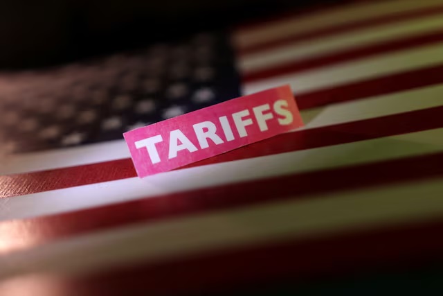 A U.S. flag and a "tariffs" label are seen in this illustration taken April 10, 2025. REUTERS/Dado Ruvic/Illustration/File Photo 