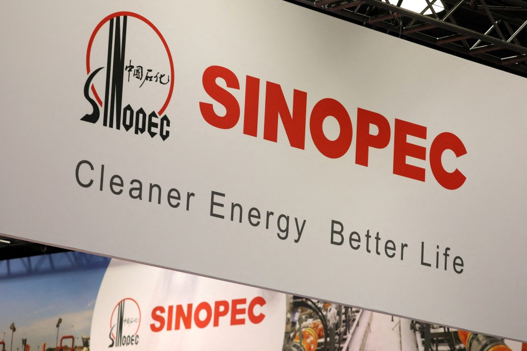 The logo of China Petroleum & Chemical Corporation, or Sinopec, is displayed during the LNG 2023 energy trade show in Vancouver, British Columbia, Canada, July 12, 2023. REUTERS