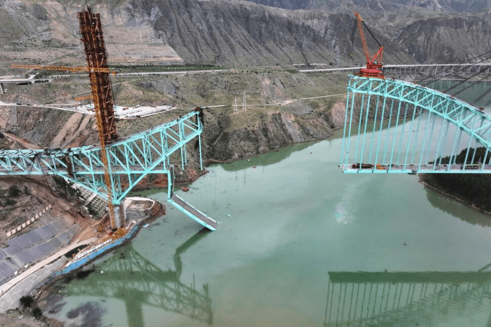 This aerial photo released by Xinhua News Agency shows the site of an under construction bridge that collapsed on the Qinghai section of the Sichuan-Qinghai Railway causing multiple dead and missing, in northwest China's Qinghai Province on Friday, Aug. 22, 2025. (Li Zhanyi/Xinhua via AP)
