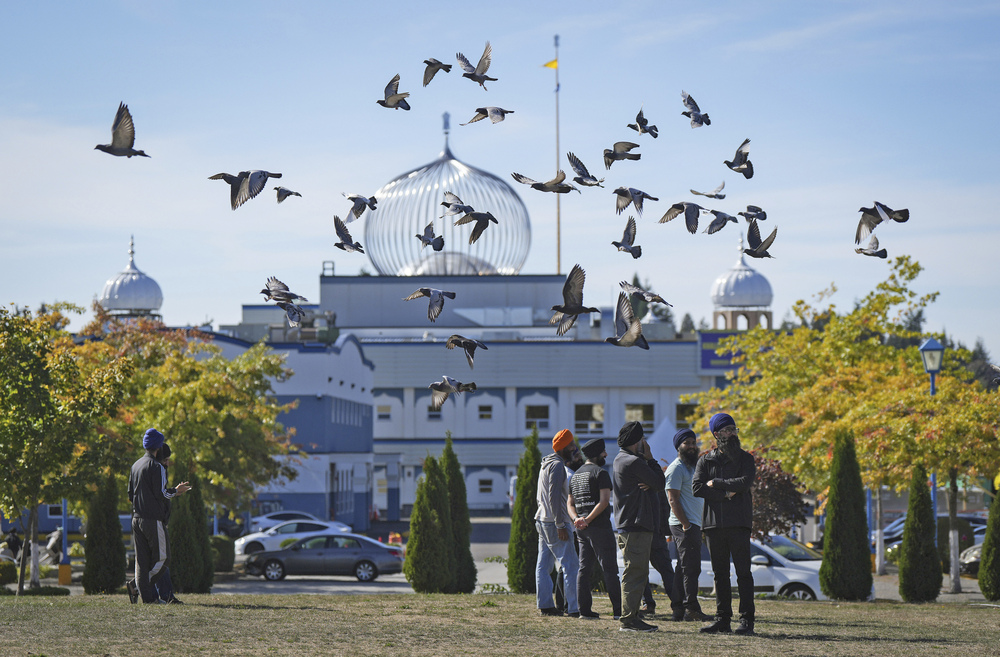 People gather at the Sikh temple where Hardeep Singh Nijjar was gunned down. AP People gather at the Sikh temple where Hardeep Singh Nijjar was gunned down. AP