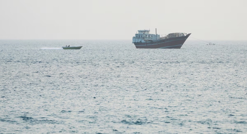 A vessel at the Strait of Hormuz, as seen from Musandam,Oman, July 15, 2026. REUTERS/Stringer 