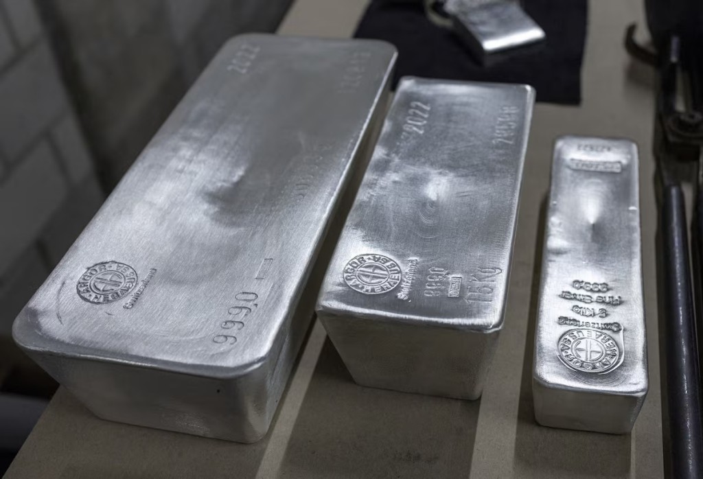 Silver bars are pictured in a display area at the plant of refiner and bar manufacturer Argor-Heraeus in Mendrisio, Switzerland, July 13, 2022. REUTERS