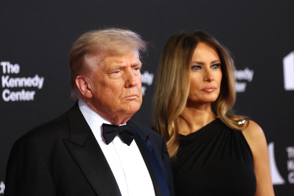 US President Donald Trump (L) and First Lady Melania Trump arrive to attend the opening night of "Les Miserables" at the Kennedy Center in Washington, DC, on June 11, 2025. (AFP/File)
