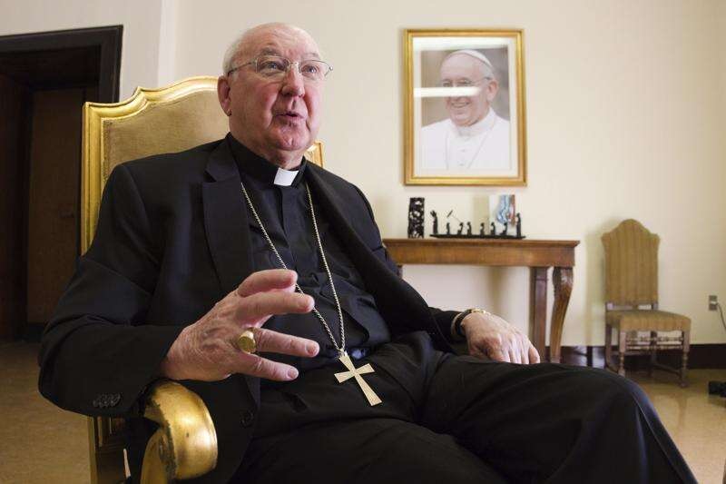 FILE - Cardinal Kevin Farrell, head of the Vatican's family and laity office, speaks during an interview with The Associated Press in Rome, July 31, 2018. (AP Photo/Paolo Santalucia, File)