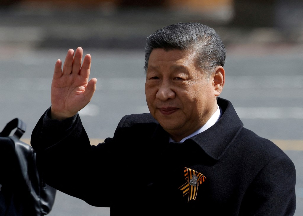 Chinese President Xi Jinping waves to spectators as he leaves after a military parade on Victory Day, marking the 80th anniversary of the victory over Nazi Germany in World War Two, in Red Square in central Moscow, Russia, May 9, 2025. (Reuters/File)