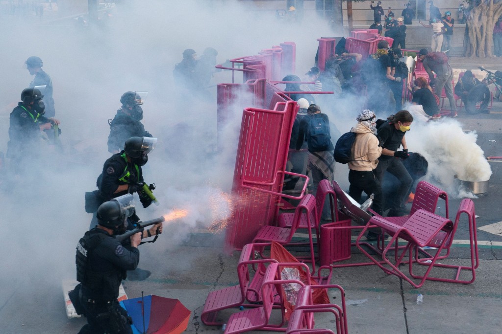 Police clear demonstrators after they blocked a street with a barricade during a protest against federal immigration sweeps in downtown Los Angeles, California, U.S. June 8, 2025. (Reuters)