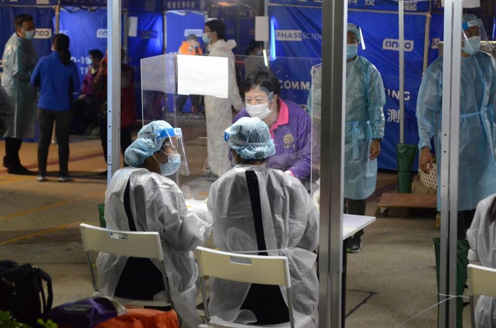 Residents undergo compulsory Covid-19 testing. 