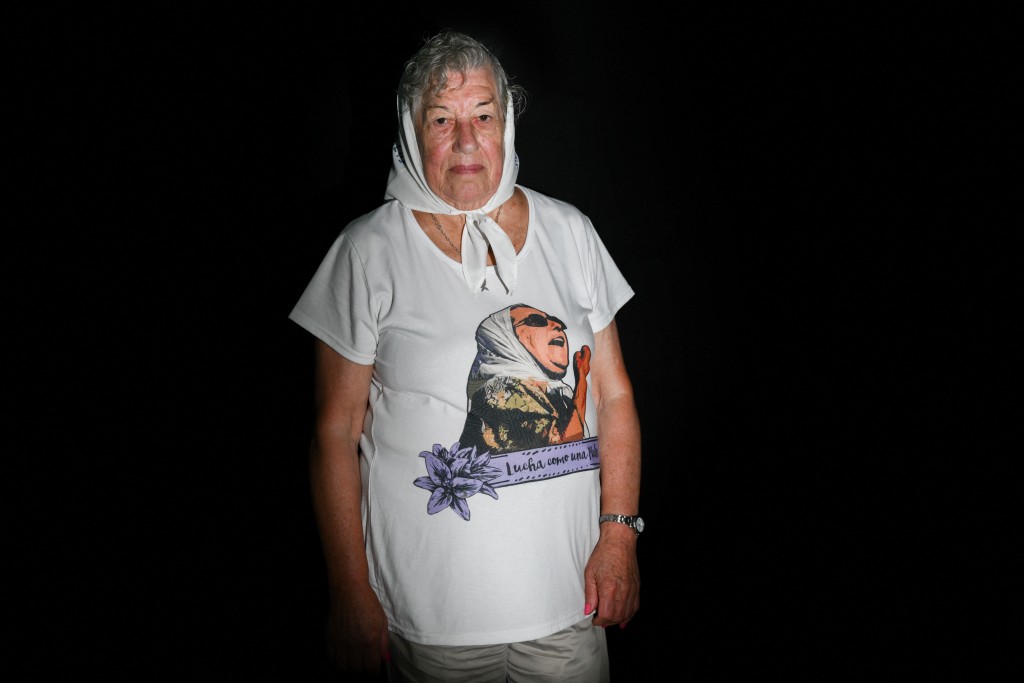 Photo by LUIS ROBAYO / AFP  Carmen Arias, 84, president of the Madres de Plaza de Mayo human rights organization and sister of Angel Arias, who was abducted and disappeared on May 17, 1977 during the military dictatorship (1976-1983), poses for a photo in Buenos Aires on March 19, 2026.