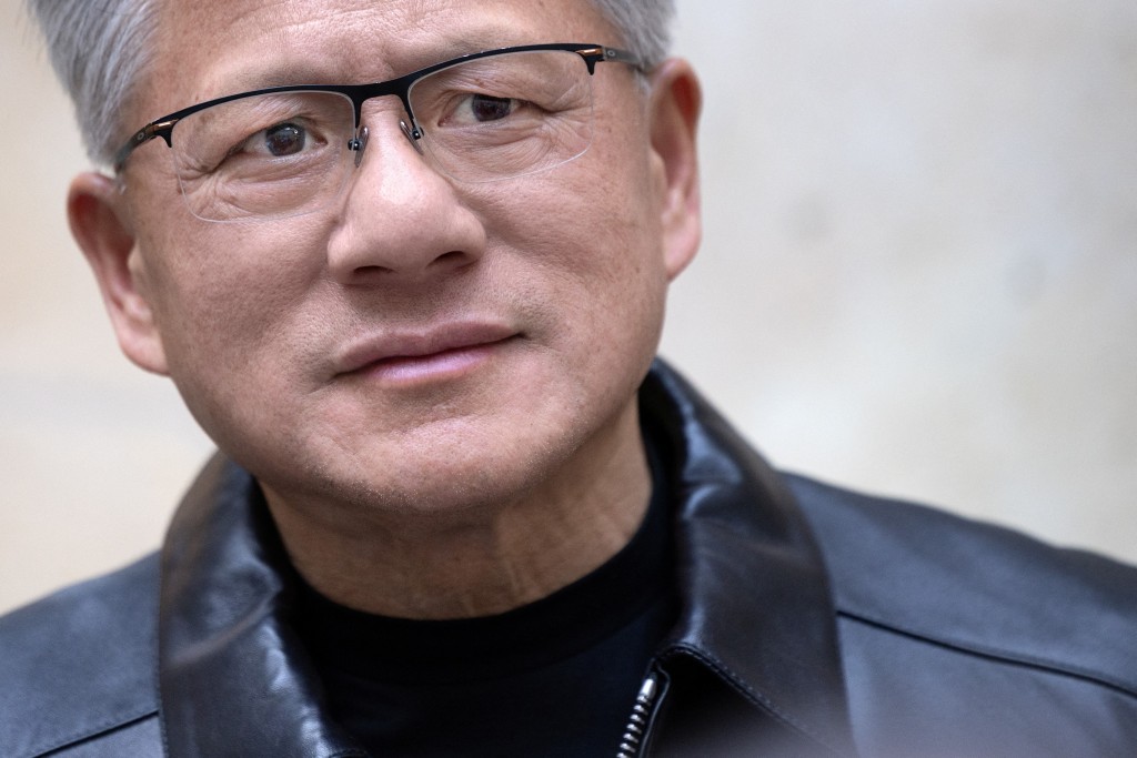 Co-founder, President and CEO of US technology company Nvidia, Jensen Huang, looks on during a press briefing in Paris on October 13, 2026. (Photo by JOEL SAGET / AFP)