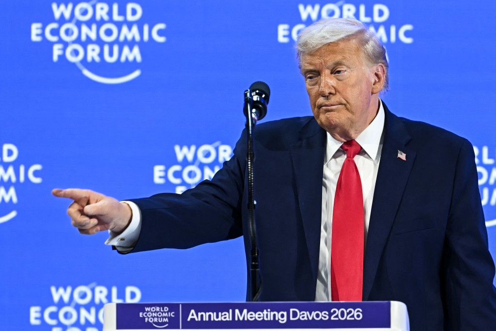 Photo by FABRICE COFFRINI / AFP  US President Donald Trump gestures during the World Economic Forum (WEF) annual meeting in Davos on January 21, 2026.