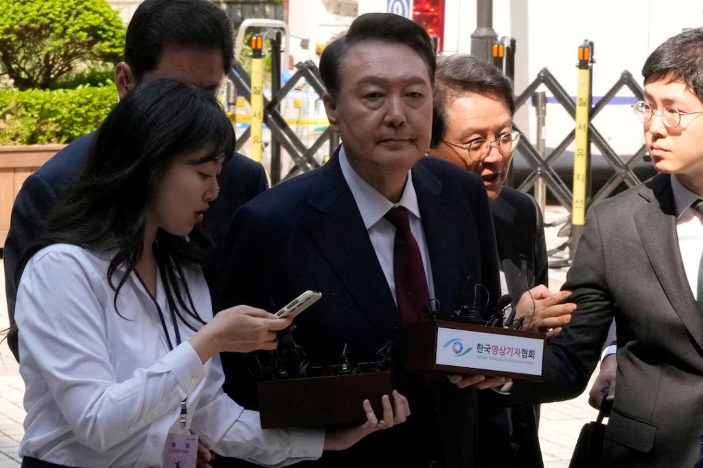 South Korea's ousted President Yoon Suk Yeol, who is facing charges of orchestrating a rebellion when he declared martial law, arrives to attend his trial at the Seoul Central District Court in Seoul, South Korea, Monday, May 12, 2025. Ahn Young-joon/Pool via REUTERS/File Photo