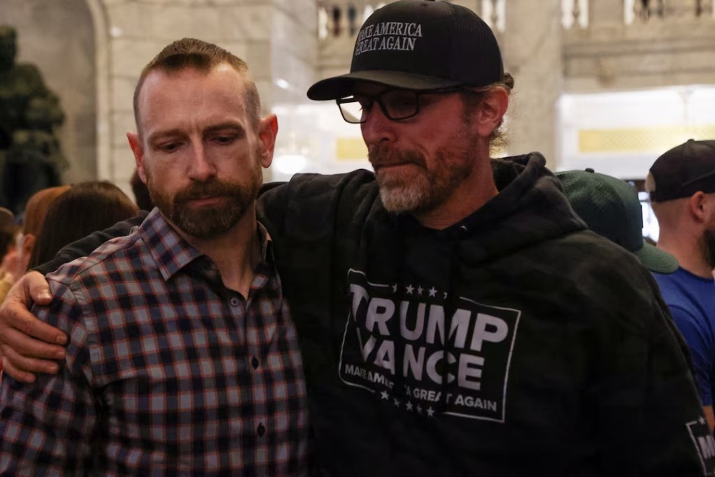  People react as they attend a vigil after U.S. right-wing activist, commentator, Charlie Kirk, an ally of U.S. President Donald Trump, was fatally shot during an event at Utah Valley University, at the Utah State Capitol, in Salt Lake City, Utah, U.S. September 10, 2025. REUTERS/Jim Urquhart 