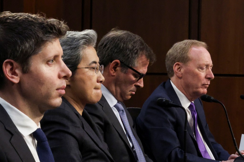 OpenAI chief executive Sam Altman; Lisa Su, CEO and chair of Advanced Micro Devices (AMD); Michael Intrator, co-founder and CEO of CoreWeave; and Brad Smith, vice chair and president of the Microsoft Corporation, are seated to testify before a Senate Commerce, Science, and Transportation Committee hearing titled Winning the AI Race: Strengthening US Capabilities in Computing and Innovation, on Capitol Hill in Washington, DC, US, May 8, 2025. REUTERS