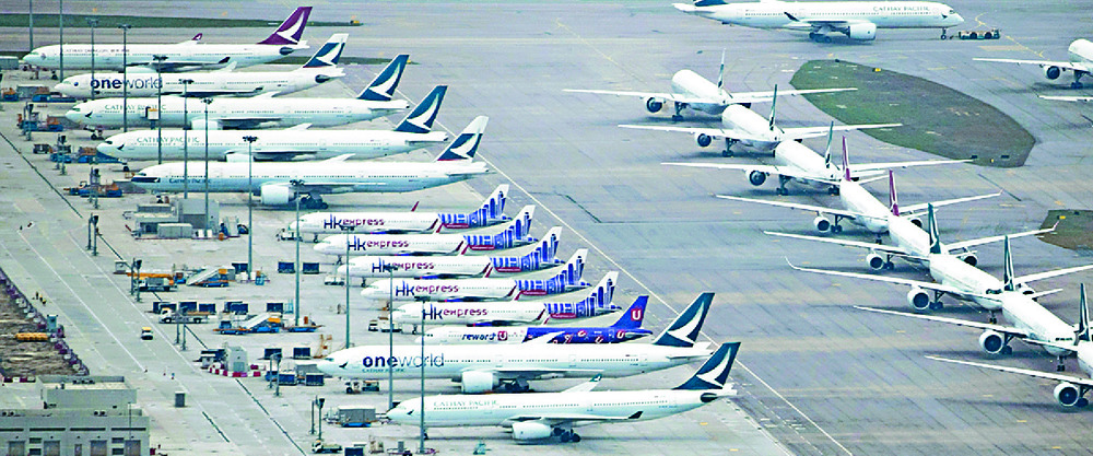 More planes than usual are parked at the airport. AP More planes than usual are parked at the airport. AP
