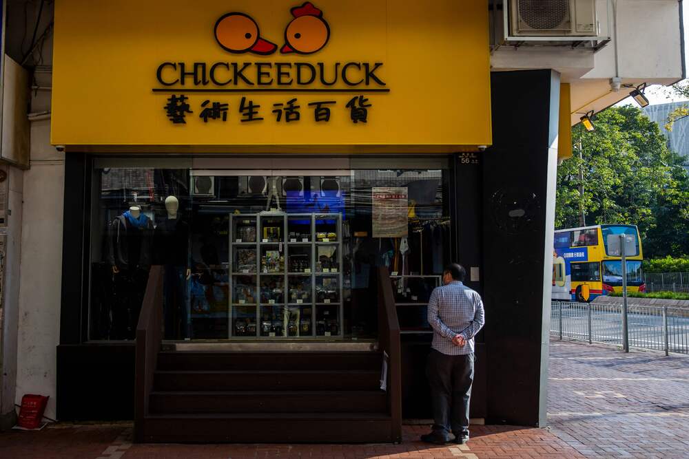 The last of the Chickeeduck shops at Causeway Bay, owner Herbert Chow and a protest statue in one of his shops. AFP, REUTERS The last of the Chickeeduck shops at Causeway Bay, owner Herbert Chow and a protest statue in one of his shops. AFP, REUTERS