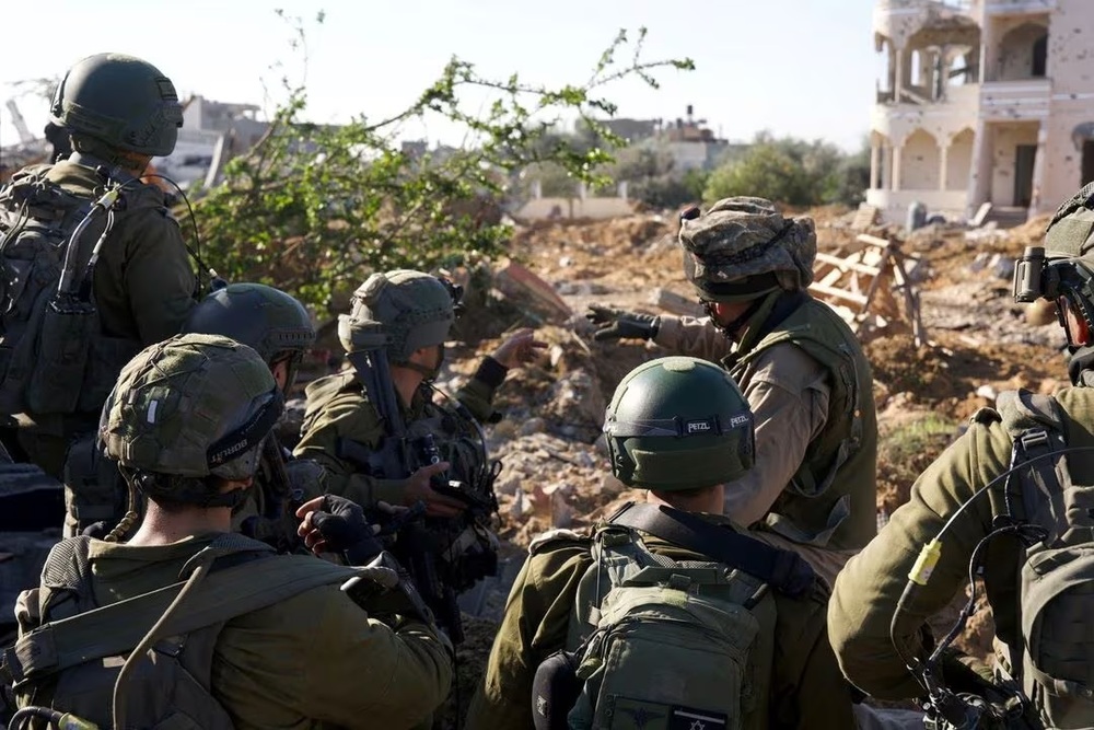 Israeli soldiers operate in the Gaza Strip amid the ongoing conflict between Israel and the Palestinian Islamist group Hamas, in this undated handout picture released on February 24, 2024. (Israel Defense Forces/Handout via REUTERS) Israeli soldiers operate in the Gaza Strip amid the ongoing conflict between Israel and the Palestinian Islamist group Hamas, in this undated handout picture released on February 24, 2024. (Israel Defense Forces/Handout via REUTERS)