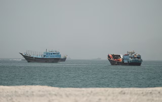 Vessels at the Strait of Hormuz, as seen from Musandam, Oman, June 24, 2026. REUTERS/Stringer