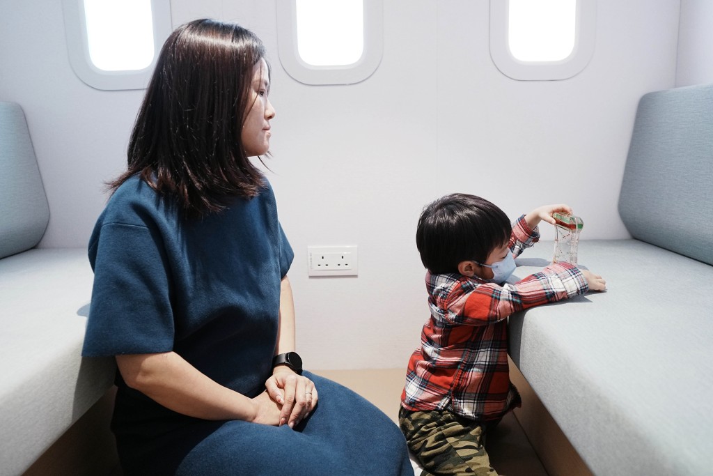 Shing and her four-year-old boy with autism spectrum disorder. 