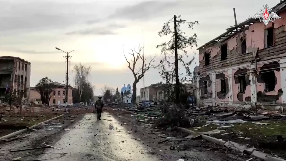 A Russian service member walks past destroyed buildings in the town of Sudzha, which was recently retaken by Russia's armed forces in the course of Russia-Ukraine conflict in the Kursk region, Russia, in this still image from video released March 15, 2025. Russian Defence Ministry/Handout via REUTERS A Russian service member walks past destroyed buildings in the town of Sudzha, which was recently retaken by Russia's armed forces in the course of Russia-Ukraine conflict in the Kursk region, Russia, in this still image from video released March 15, 2025. Russian Defence Ministry/Handout via REUTERS
