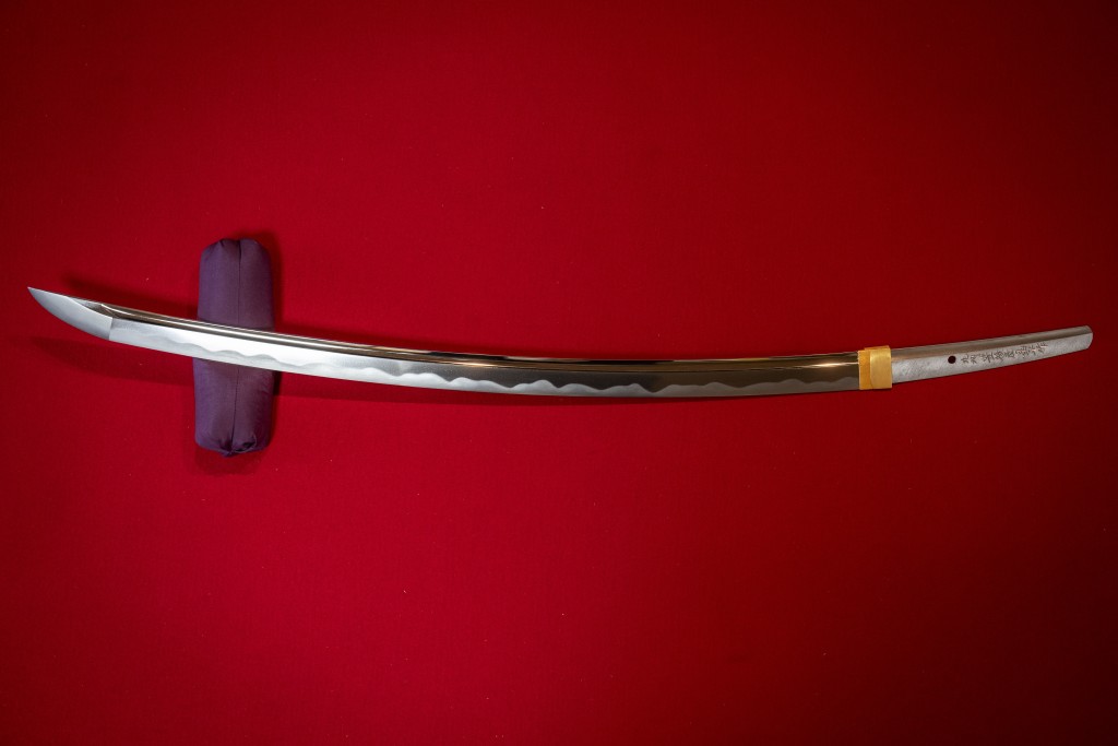 Photo by YUICHI YAMAZAKI / AFP  This picture taken on January 9, 2026 shows a katana made by swordsmith Akihira Kawasaki at his workshop in Misato, Saitama prefecture.