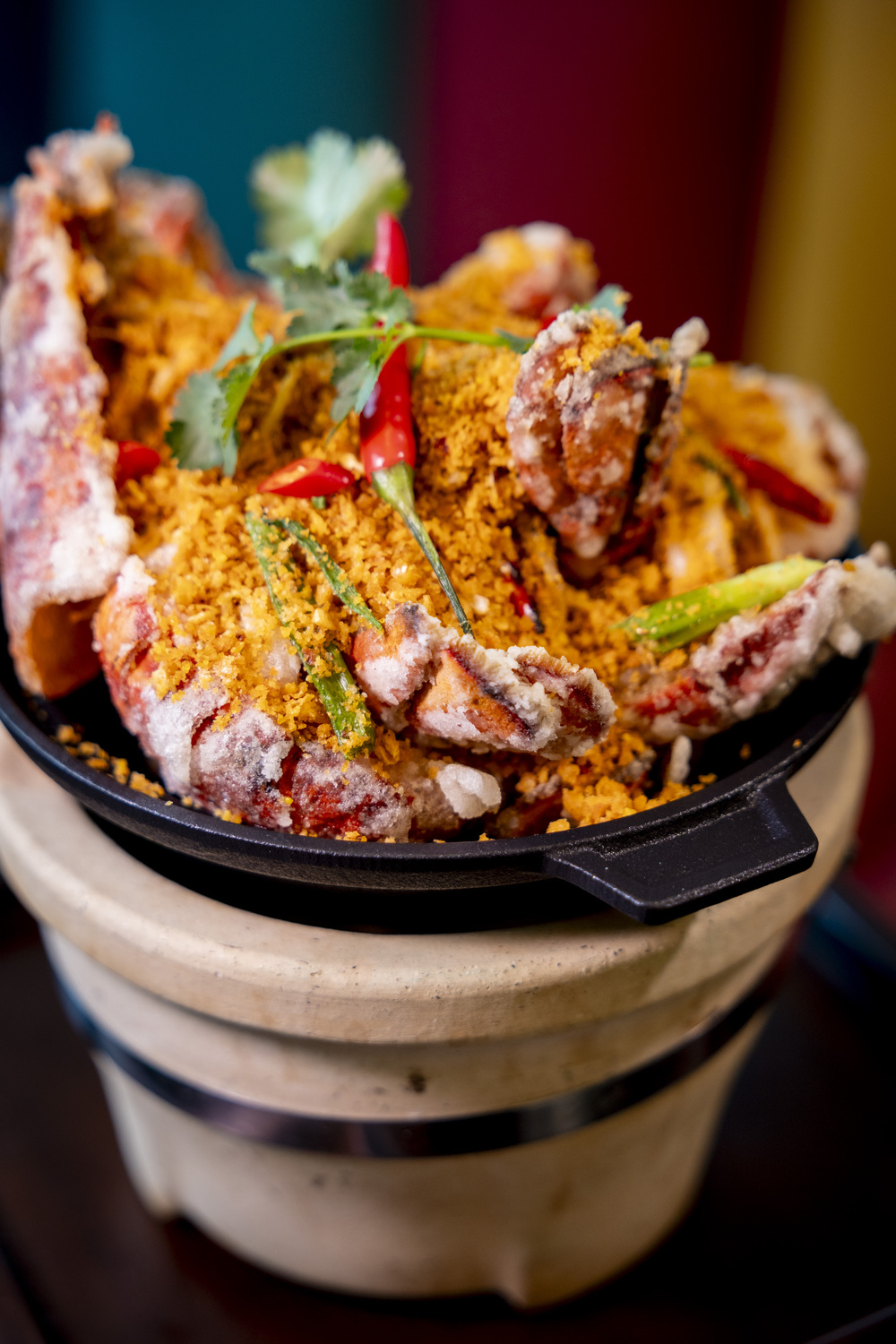 Typhoon shelter style wok-fried lobster is to be served at Hong Kong Disneyland Hotel's Enchanted Garden Restaurant this April..