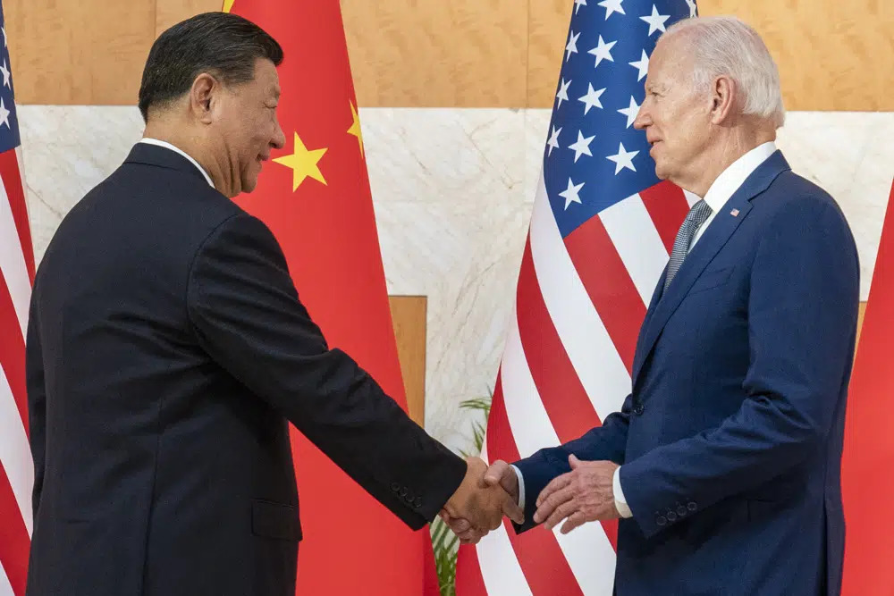 File photo: U.S. President Joe Biden, right, and Chinese President Xi Jinping shake hands before a meeting on the sidelines of the G20 summit meeting, on November 14, 2022, in Bali, Indonesia. (AP) File photo: U.S. President Joe Biden, right, and Chinese President Xi Jinping shake hands before a meeting on the sidelines of the G20 summit meeting, on November 14, 2022, in Bali, Indonesia. (AP)