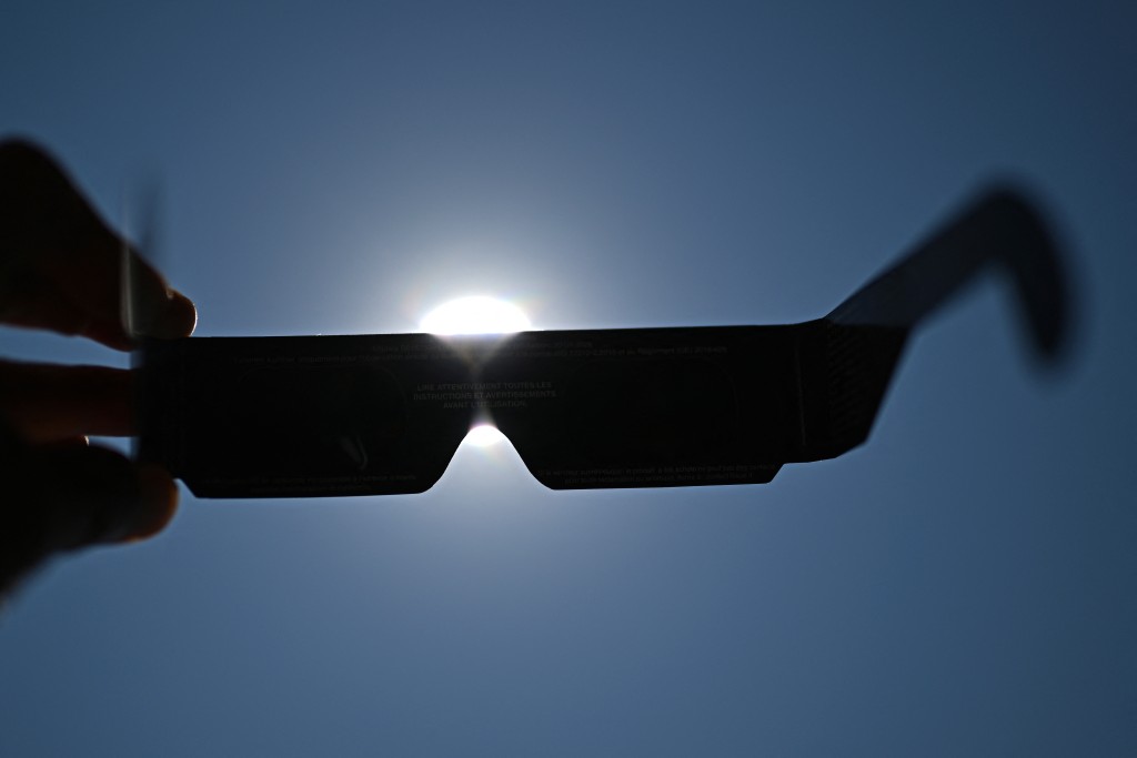 Photo by GABRIEL BOUYS / AFP  This photograph shows eclipse-viewing glasses for direct observation of the sun in Beziers, Southern France, on August 5, 2026, ahead of the August 12 solar eclipse.