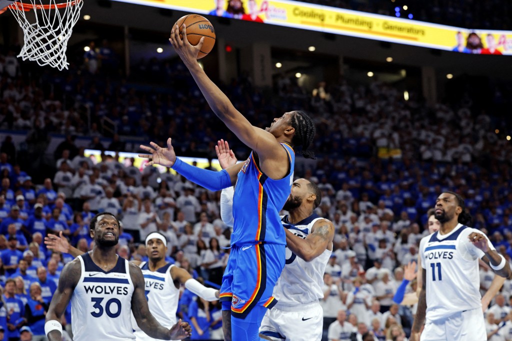 Oklahoma City Thunder forward Jalen Williams (8) drives to the basket against Minnesota Timberwolves guard Mike Conley (10) during the fourth quarter in game five of the western conference finals. (Reuters)