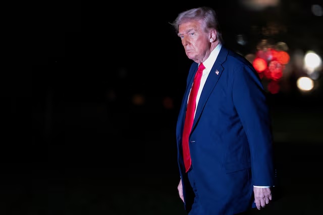 U.S. President Donald Trump walks across the South Lawn while returning to the White House in Washington, D.C., U.S., March 30, 2025. REUTERS/Nathan Howard U.S. President Donald Trump walks across the South Lawn while returning to the White House in Washington, D.C., U.S., March 30, 2025. REUTERS/Nathan Howard