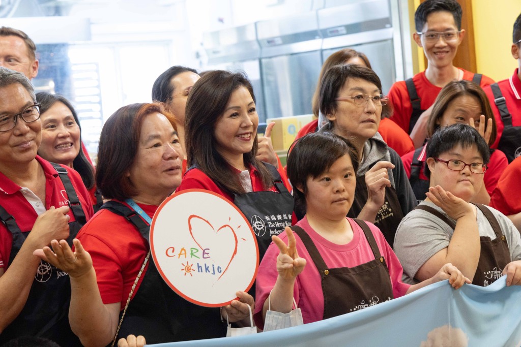 Club Executive Director, Membership and Customer Excellence, Terecina Kwong (2nd left, 2nd row), joins colleagues in baking horse-shaped cookies with persons with intellectual disabilities and people undergoing rehabilitation, promoting social inclusion. Club Executive Director, Membership and Customer Excellence, Terecina Kwong (2nd left, 2nd row), joins colleagues in baking horse-shaped cookies with persons with intellectual disabilities and people undergoing rehabilitation, promoting social inclusion.