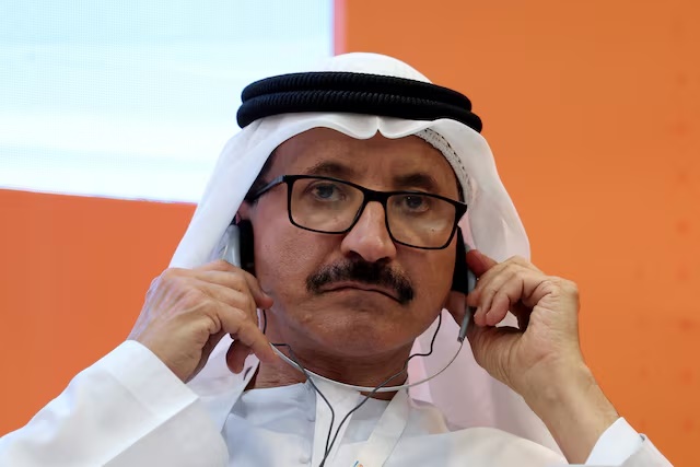 Sultan Ahmed bin Sulayem wears his headphones during the UAE-India Business summit at the Mahatma Mandir in Gandhinagar, Gujarat, India January 10, 2024. REUTERS/Amit Dave/File Photo 