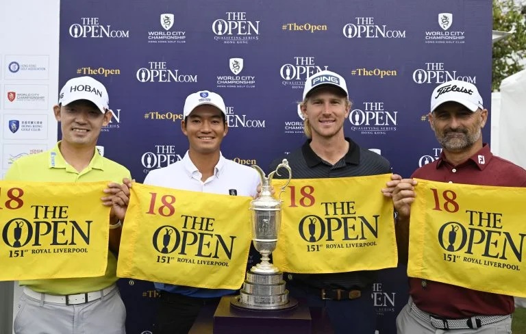 L-R- Open qualifiers – Bio Kim of Korea, Taichi Kho of Hong Kong, Travis Smyth of Australia and Michael Hendry of New Zealand pictured with the Open championship flags and the Claret Jug. (Asian Tour)