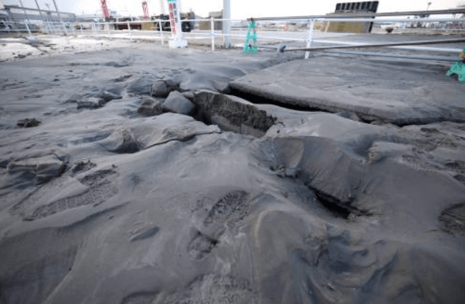  Suspected soil liquefaction near the Hachinohe Port ferry terminal caused the ground to crack, spew mud, and partially sink. AFP