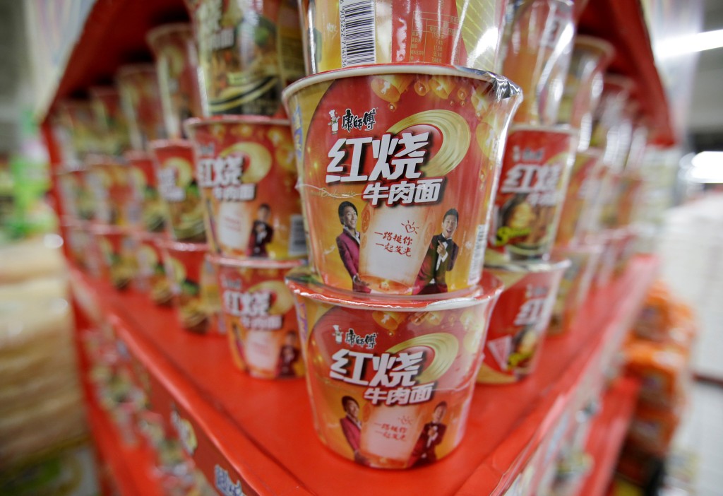Cups of Tingyi instant noodles are displayed for sale at a supermarket in Beijing, China. REUTERS/Jason Lee/File Photo