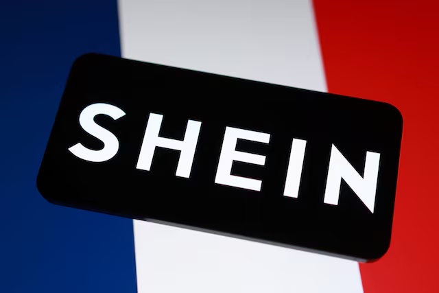 Shein logo and French flag in this illustration taken November 5, 2025. REUTERS/Dado Ruvic/Illustration