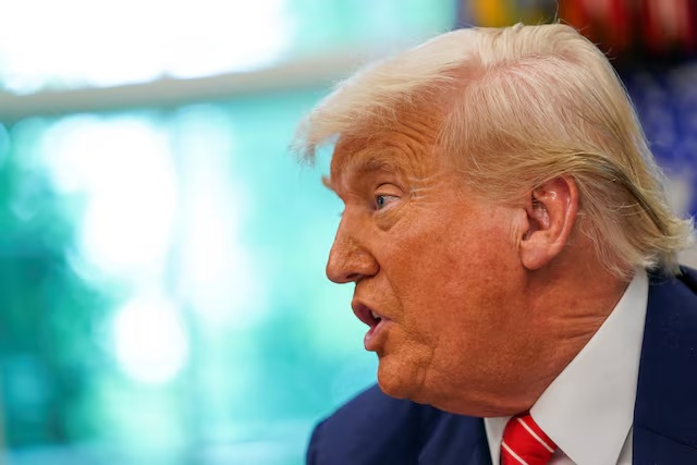 U.S. President Donald Trump speaks during a press conference with Elon Musk (not pictured) in the Oval Office of the White House, in Washington, D.C., U.S., May 30, 2025. REUTERS/Nathan Howard/File photo