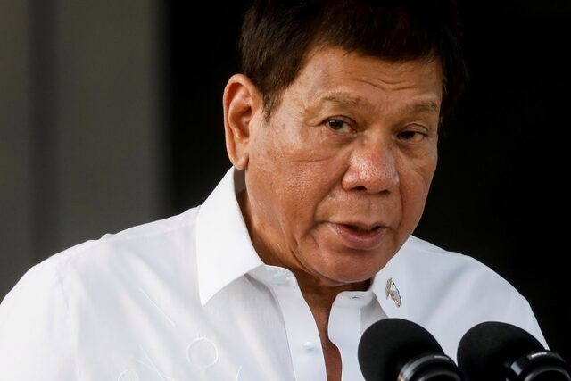 Philippine President Rodrigo Duterte speaks during the arrival ceremony for the first COVID-19 vaccines to arrive in the country, at Villamor Air Base in Pasay, Metro Manila, Philippines, February 28, 2021. REUTERS/Eloisa Lopez/File Photo 