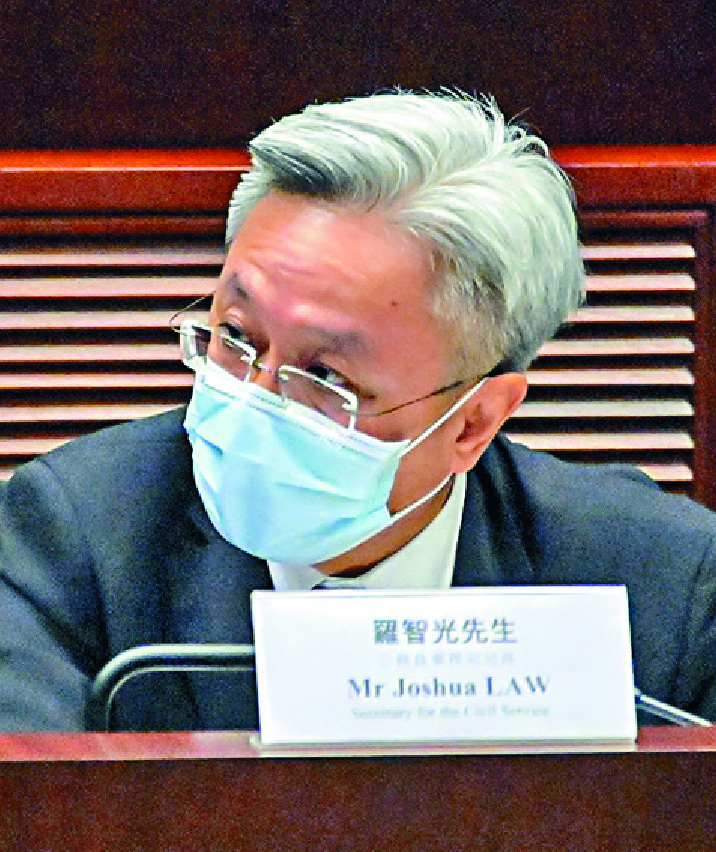 Regina Ip, near left, at the public service panel meeting.Above: Joshua Law. Regina Ip, near left, at the public service panel meeting.Above: Joshua Law.