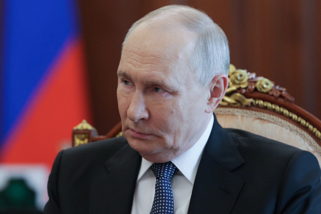 In this pool photograph distributed by the Russian state agency Sputnik, Russia's President Vladimir Putin attends a meeting with governor of Stavropol Krai in Moscow on August 25, 2026. (Photo by Mikhail METZEL / POOL / AFP)